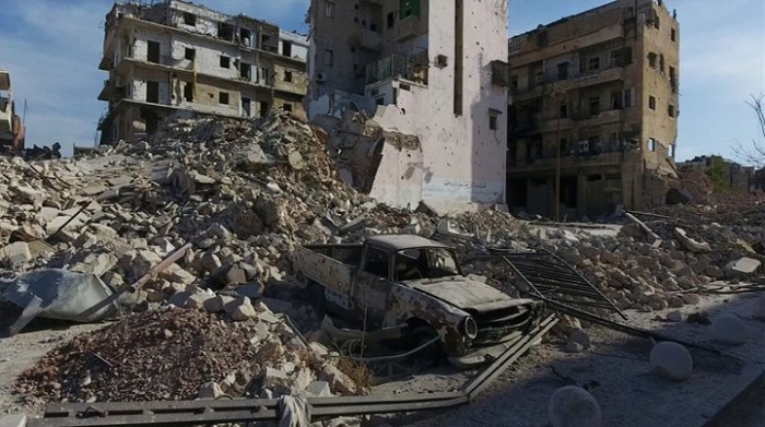 Syrian state TV says army takes key Aleppo district